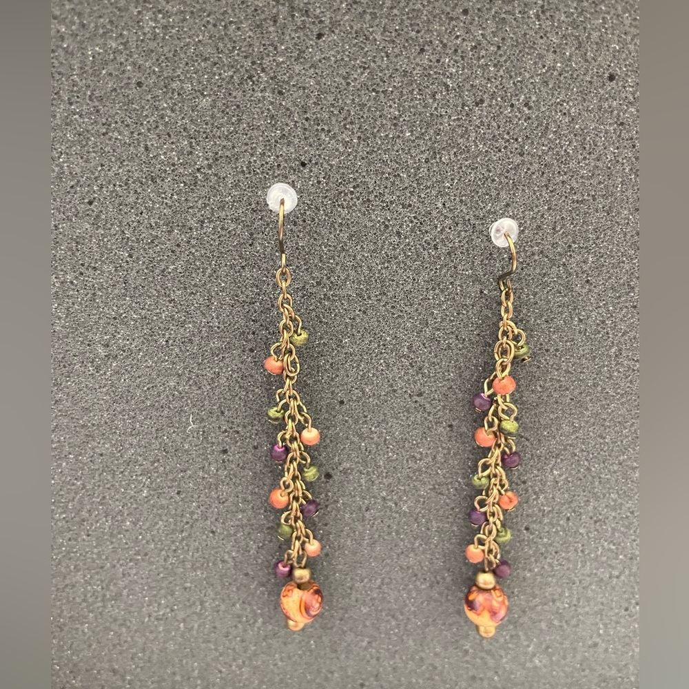 Gold, purple, green, orange earrings. Used/ good conditions.